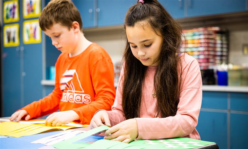 Students make kente cloths